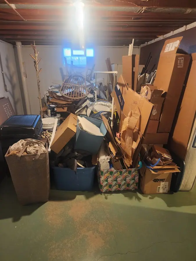 Roll-off dumpster container at job site for 8 Yard Dumpster Rental in Covington